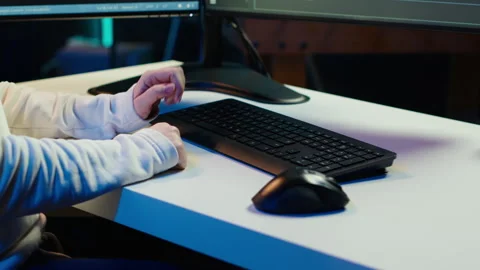 Teleworking computer technician typing on keyboard, close up Stock Footage 283595922