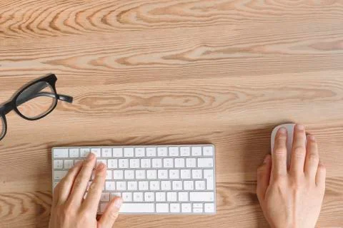 Teleworking concept. Hand with Computer Mouse. Stock Photos