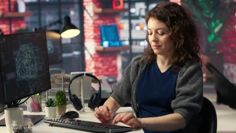 Teleworking developer using computer for artificial intelligence computing Stock Footage 308672113