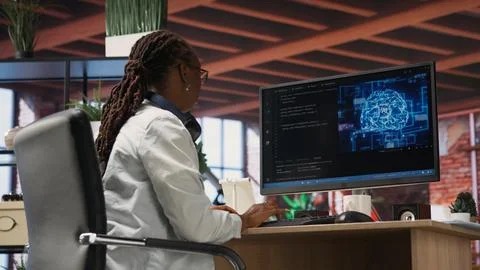 Teleworking programmer using computer for artificial intelligence computing 写真素材