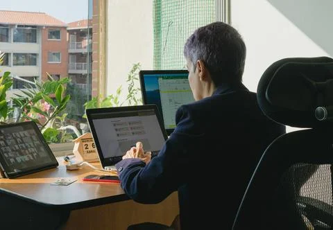 Teleworking, telecommuting, work at home Stock Photos