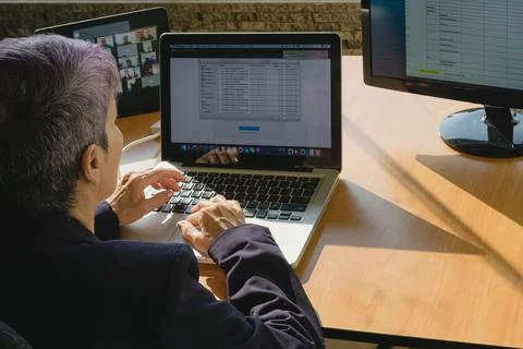 Teleworking, telecommuting, work at home Stock Photos