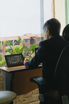 Teleworking, telecommuting, work at home Stock Photos
