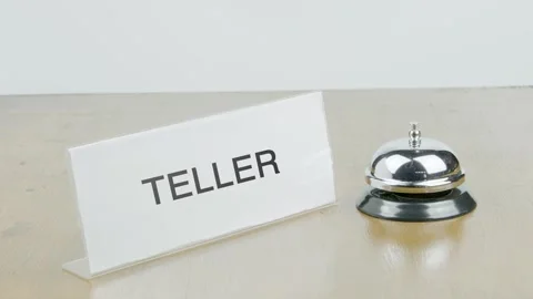 Teller Office or Room with Hand Ringing The Bell on Desk or Table Stock Footage 300834995