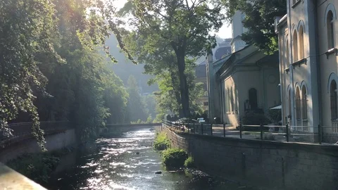 Telpa river shining in backlight in Karlovy Vary, Czech Republic Stock Footage 90648830