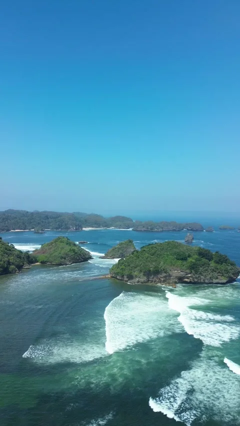 Teluk Asmara Beach ocean waves vertical view August 3 2026 Stock-Footage 342134835