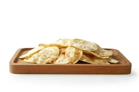 Tempeh or tempe chips isolated on white background Stock Photos
