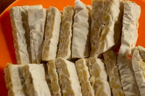 Tempeh in a plastic container Foto stock