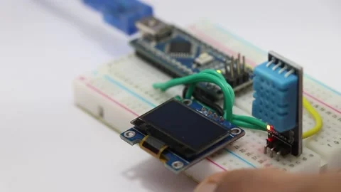 Temperature and humidity values showing on an OLED module with sensor Stock Footage 168966689