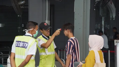 Temperature Checks in Malaysia 스톡 동영상 129780391