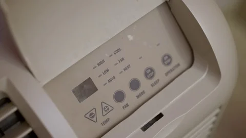 Temperature increased on air conditioner unit in hotel room 4k Видео 75614858