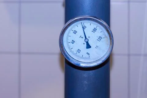 Temperature sensor is analog on chimney heating of an industrial building. Fotos de archivo