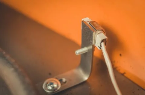 Temperature sensor inside an electric dryer for vegetables and fruits. Repair of Stock Photos