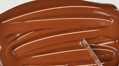 Tempering chocolate temperature for using a marble Stock Footage 94227302