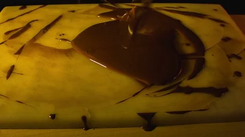 Tempering melted chocolate on table 動画素材 79842473
