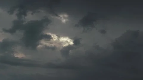 Tempestuous atmosphere with dark and foreboding grey clouds impending storm 動画素材 249301547