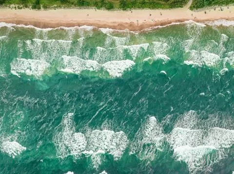 Tempestuous summer waves on the Baltic Sea in Poland. Stock Photos