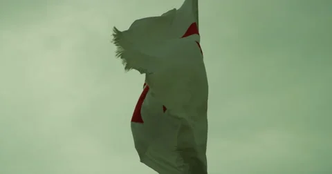 Templar Flag moving in slow motion on a cloudy day Stock Footage 67573433