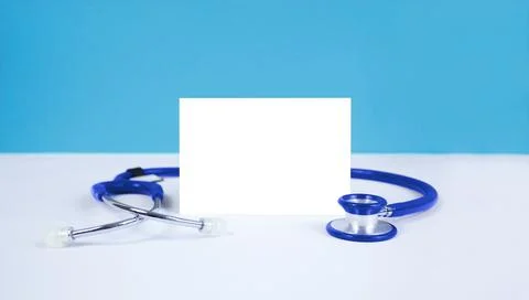 Template and stethoscope on a blue background. Place for text. Stock Photos