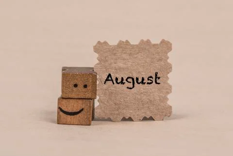 Template for august with a smiley icon Stock Photos