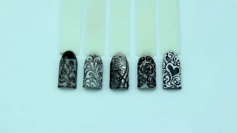 Templates of nails with black patterns Stock Footage 76824857