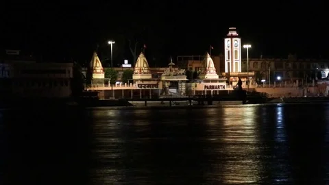Temple along River bank Stock Footage