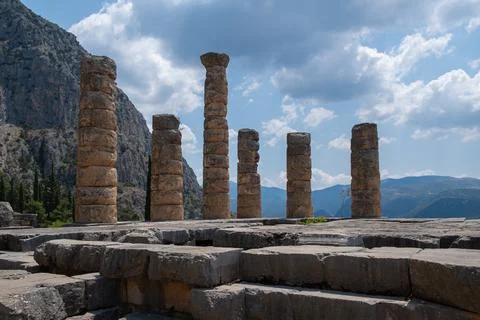 The Temple of Apollo in Delphi, Greece in a cloudy day Stock Photos