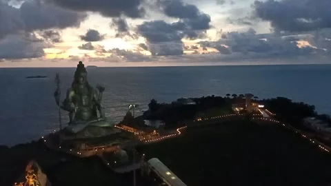 Temple on beach Murudeshwar Karnataka Stock Footage 138299134