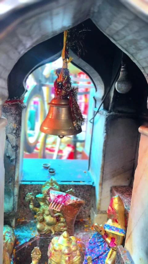 Temple Bell Hanging Inside Hindu Shrine with Spiritual Background Stock Footage 337908441