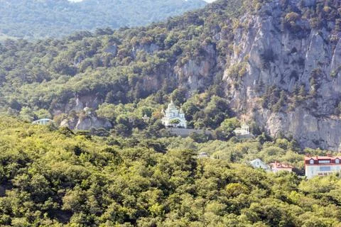 Temple at the cliff. Stock Photos