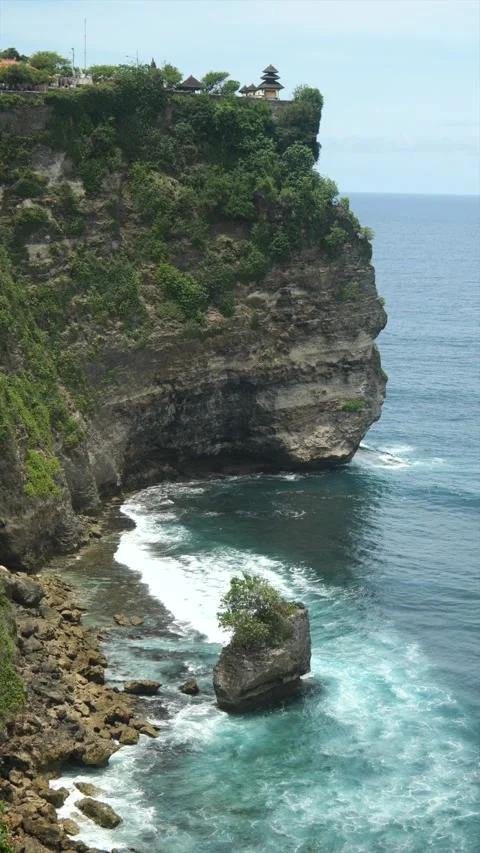 TEMPLE ON CLIFF WITH ROCKS BELOW Видео 221300883