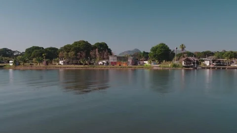 Temple complex and statue along the River Kwai in Kanchanaburi Thailand Vidéo 330451077