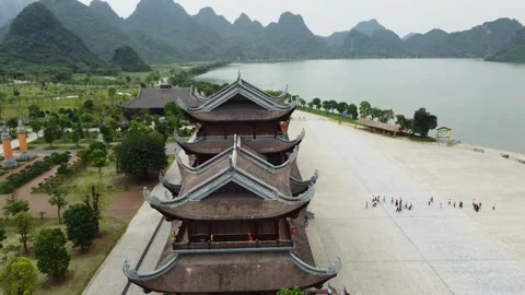 Temple complex, pagodas next to forest and mountains Stock Footage 242094579