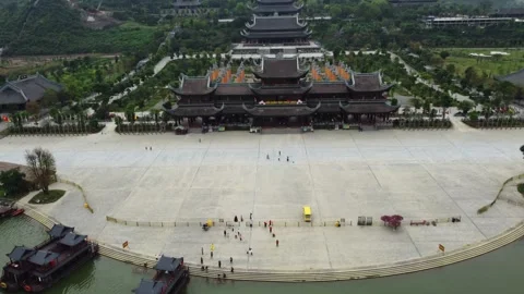 Temple complex, pagodas next to forest and mountains Stock Footage 242094668