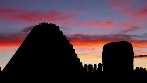Temple of Kukulkan, a big pyramid  in the ruins of the Maya city of Mayapan Stock Footage 283895619