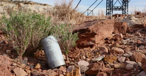 Temple Mountain Utah Abandoned Mining Area Beer Can and Tobacco Tin Stock Footage 48498675
