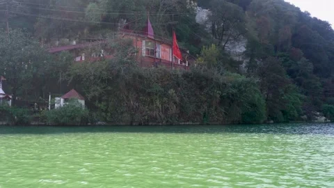 Temple Nestled Between River and Mountains in India Stock Footage 337624215
