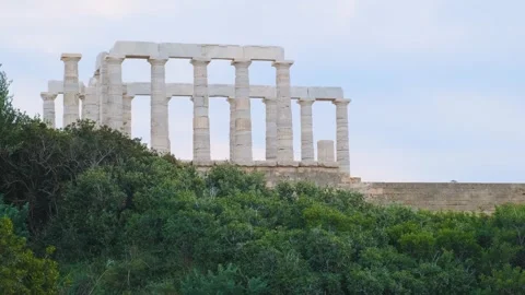 Temple of Poseidon on Cape Sounion at sunset, Attica, Greece. Ancient Greek Stock Footage 315860454