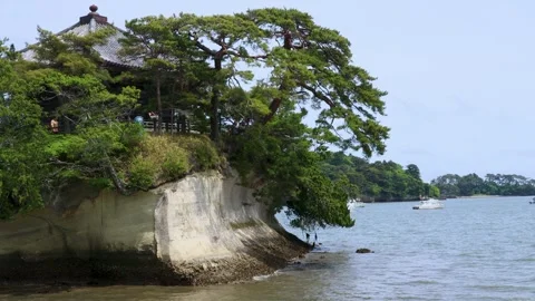 A temple on a rock by the sea Stock Footage 243868957