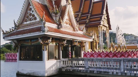 Temple at sunset. the sun goes through a beautiful structure Stock-Footage 128491661