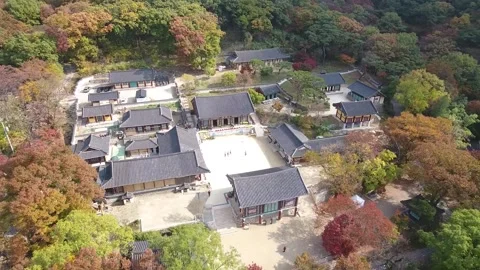 Temple surrounded by forests and mountains Stock Footage 303397665