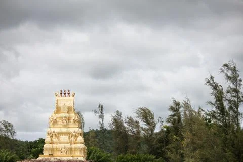 Temple tower along the mountain range of Talamalai Reserve Forest, Hasanur, T Stock Photos