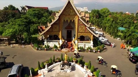 Temple tricycle town in background Видео 91277906