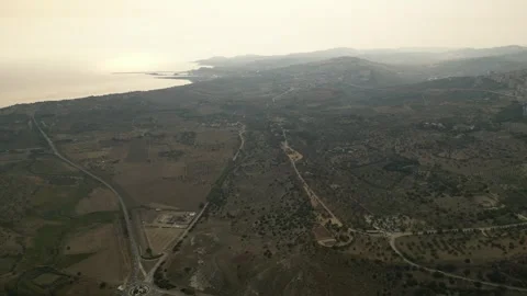 Temples of Agrigento with Mediterranean Sea - Circle-Right-Clip Video stock 250364189