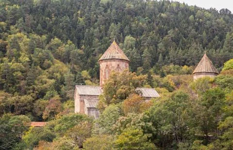 Temples of ancient Sapara monastery on mountainside in forest, Georgia Stock Photos