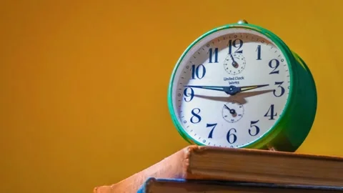 Temporal Symphony: Mesmerizing Timelapse of Alarm Watch Clock Stockbeeldmateriaal 271351248