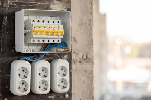 Temporary electrical distribution board with sockets on a construction site Stock Photos