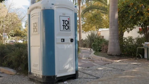 Temporary public lavatory downtown Stock Footage 120733267