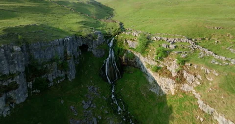 Temporary waterfall on the hills Stock Footage 312472995