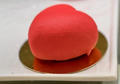 A tempting array of heartshaped desserts presented in vibrant, eyecatching Stock Photos